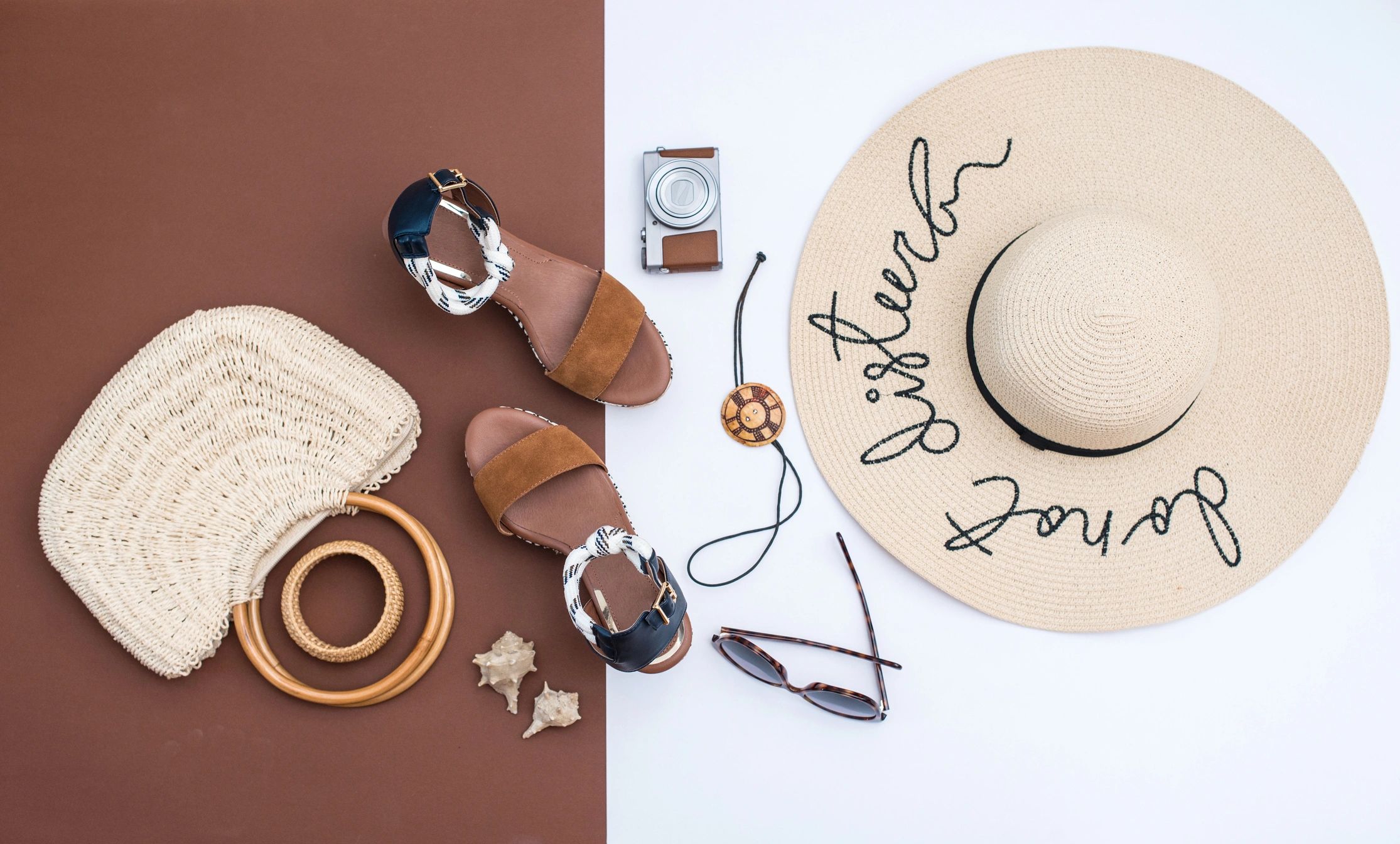 Flat lay of neutral-toned personal accessories