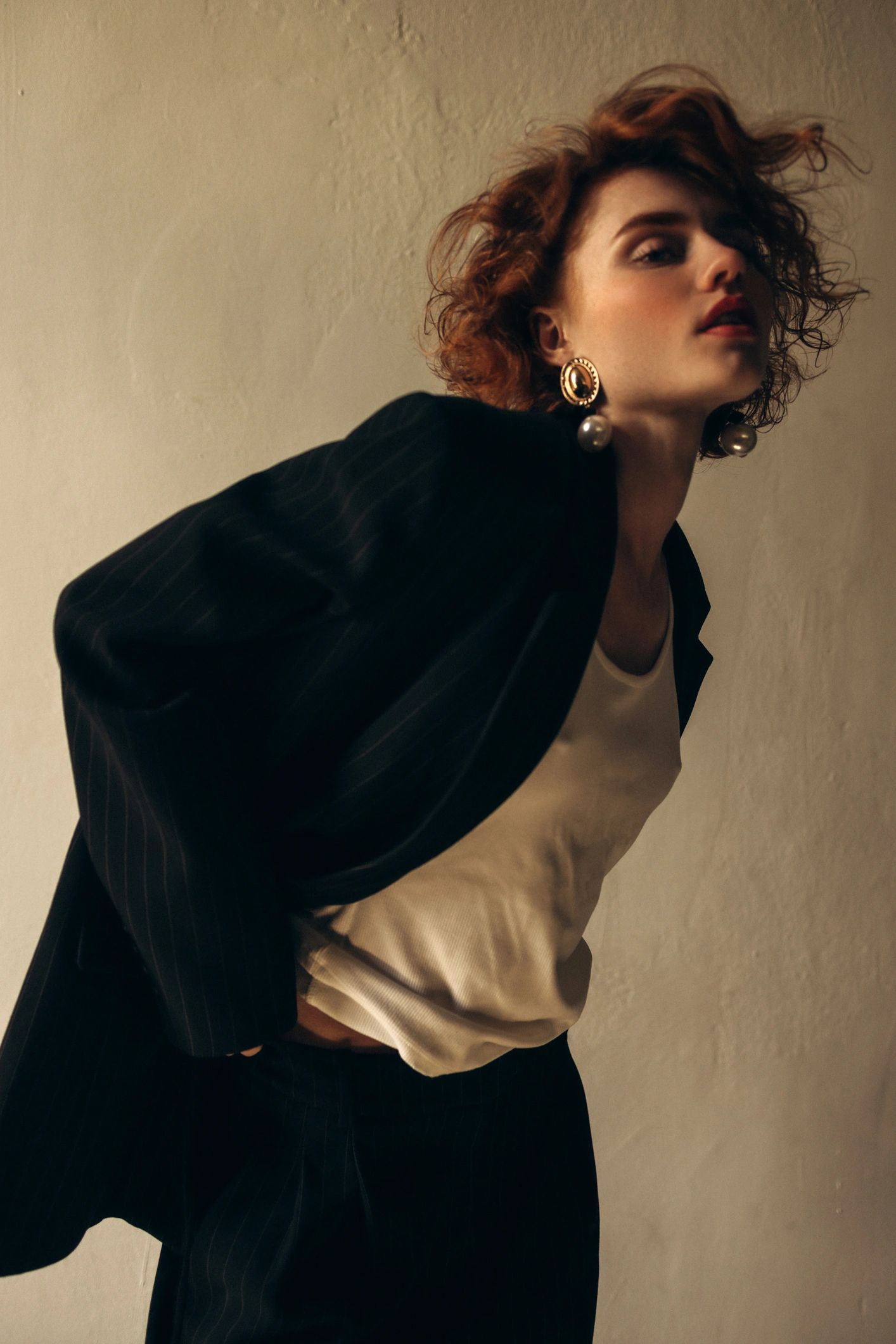 Minimal editorial portrait in neutral tones