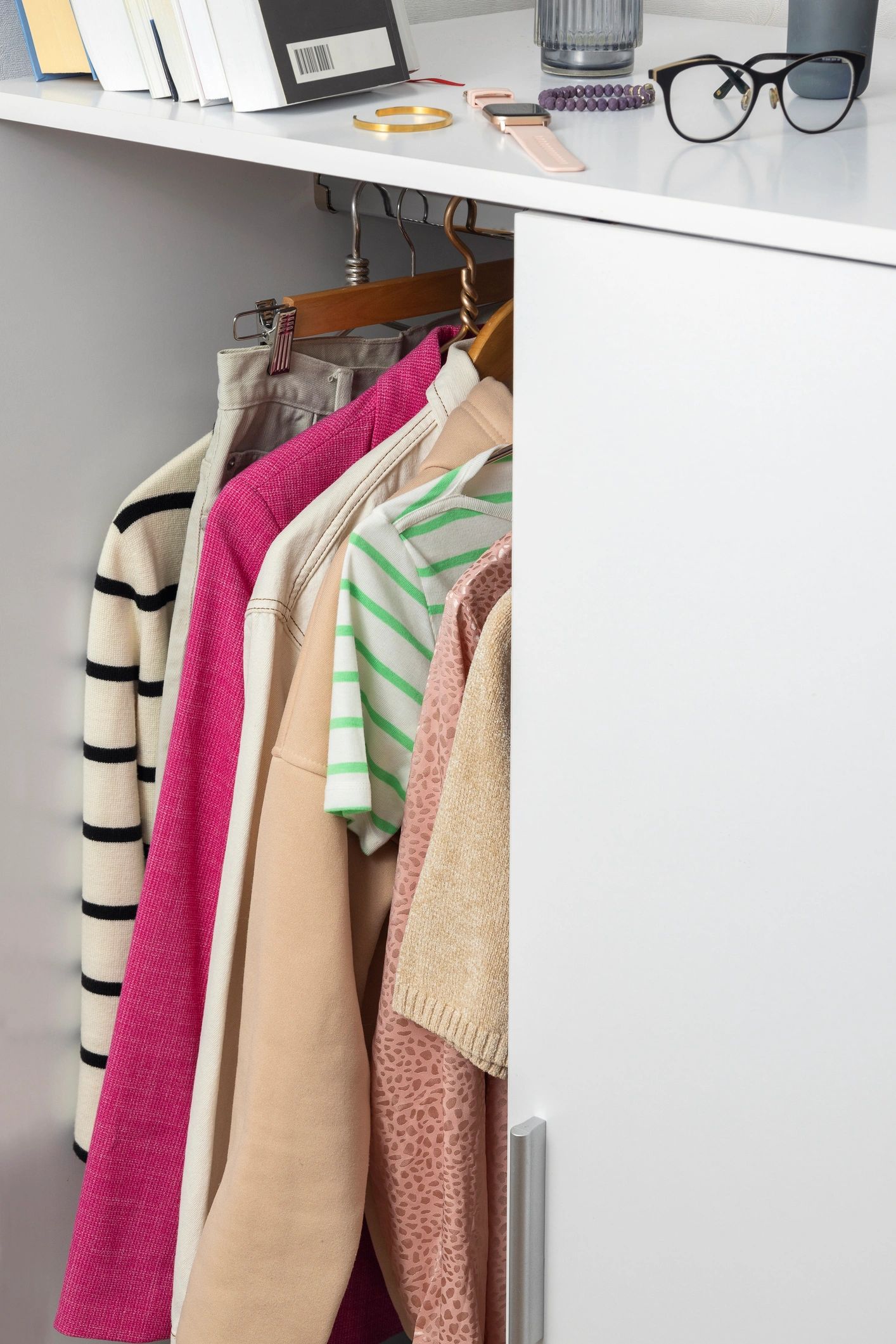 Organized closet with capsule clothing