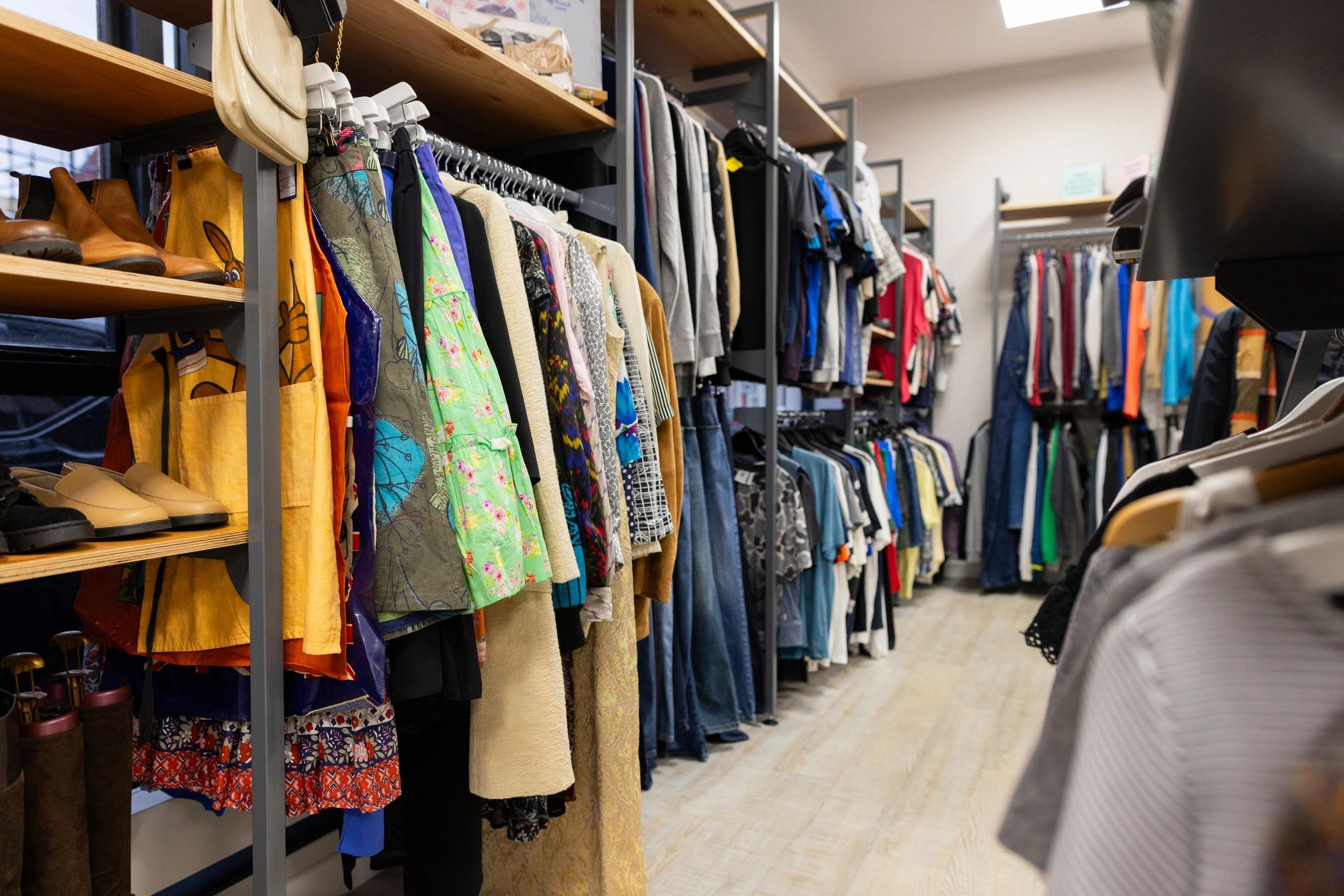 Clothing rails in a shop-like wardrobe space
